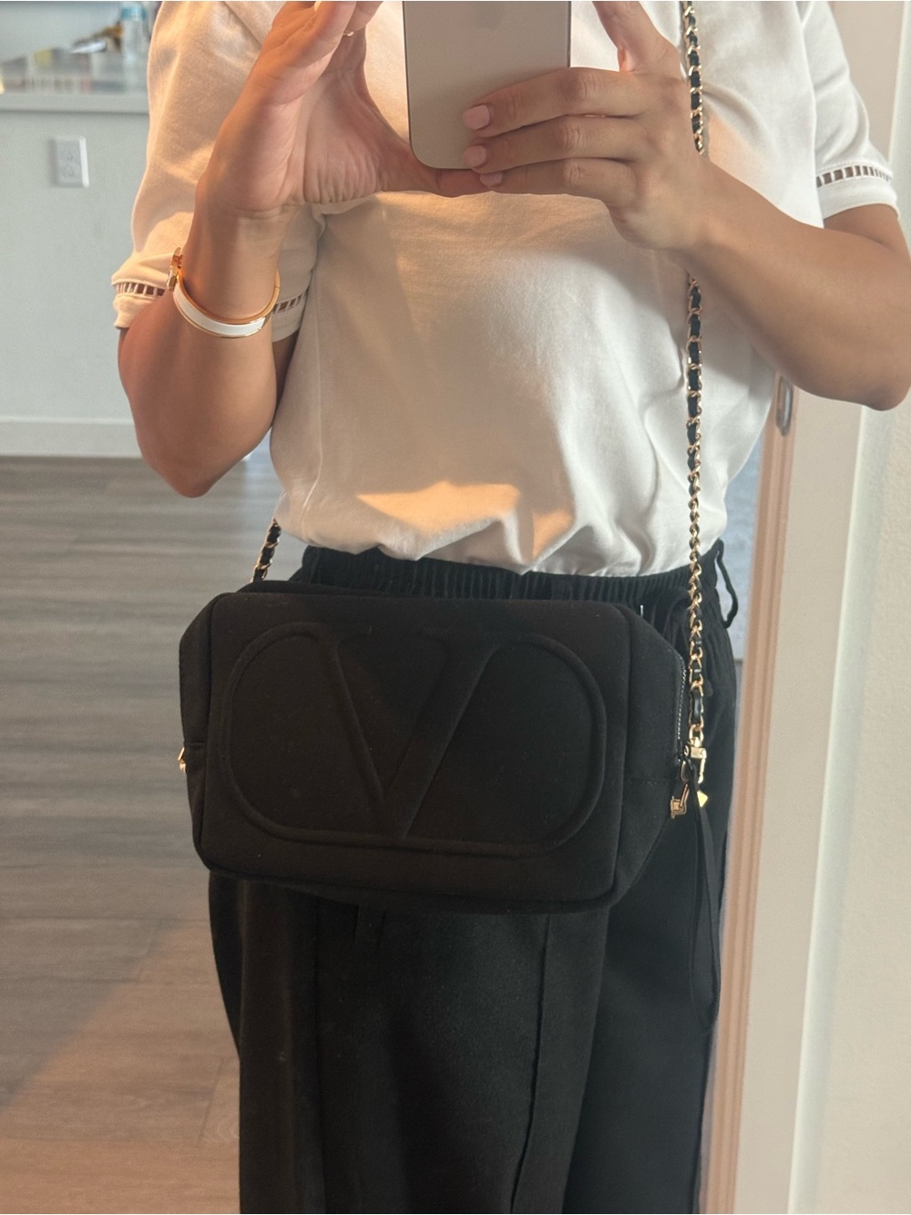 Valentino Black Crossbody Bag with Gold Chain Strap